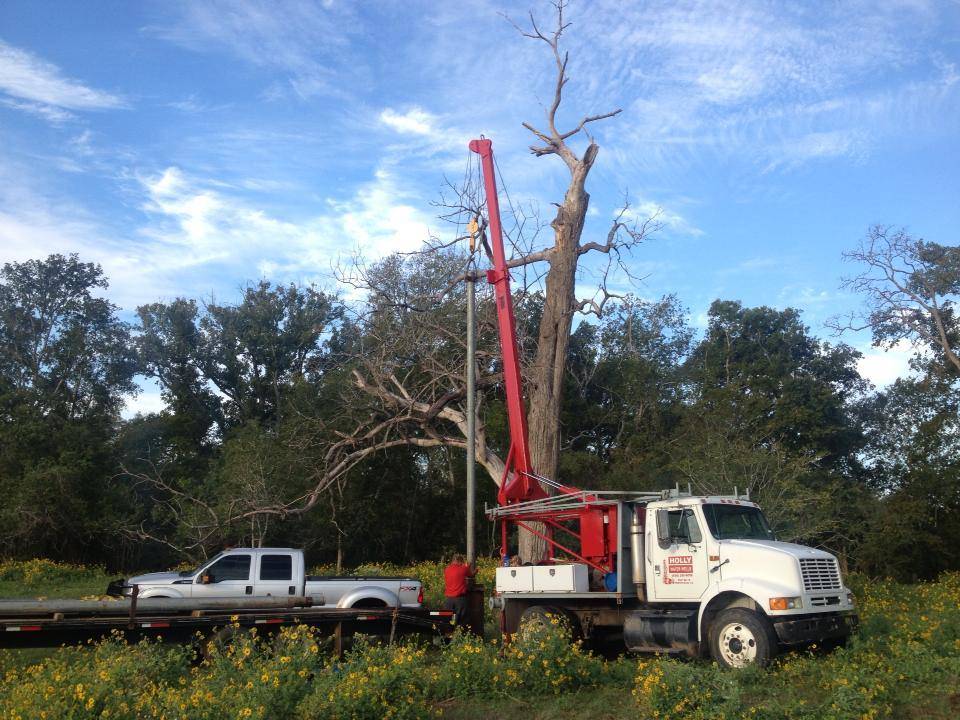 Holly Water Wells service truck working on an East Texas property
